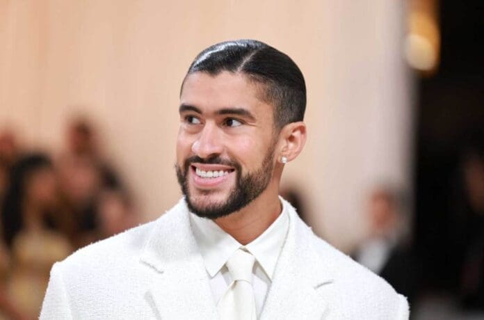 A man in a white suit shares a smiling selfie on Instagram.