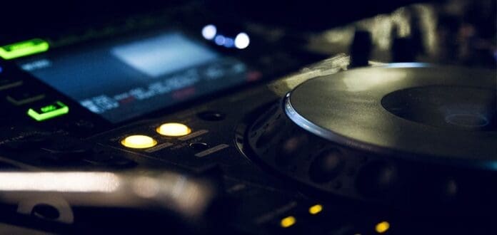 A close up of a dj's equipment. [Video]