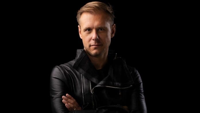 A man in a black leather jacket at Tomorrowland.