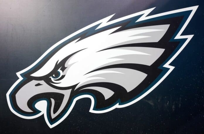 The Philadelphia Eagles logo on a dark background features the 'Kelce x Swift Duo'.