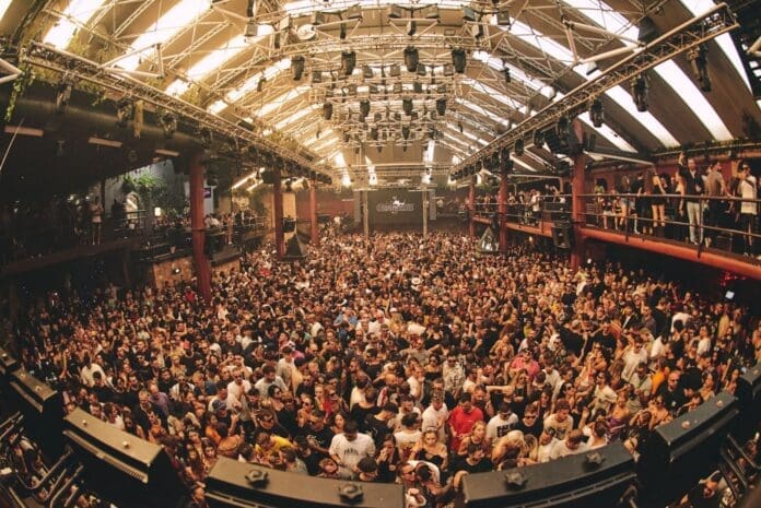 A large crowd at Amnesia Ibiza concert.