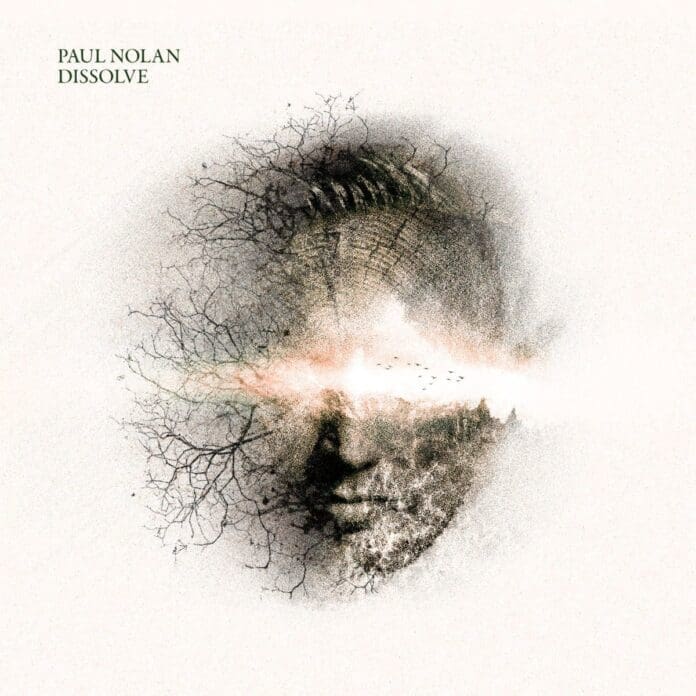 A man's face with trees in the background, featured in the review of Paul Nolan's debut album 