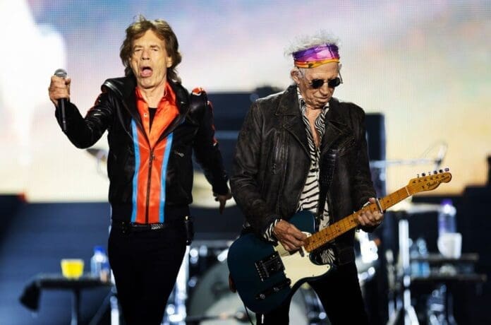 The Rolling Stones perform on stage.