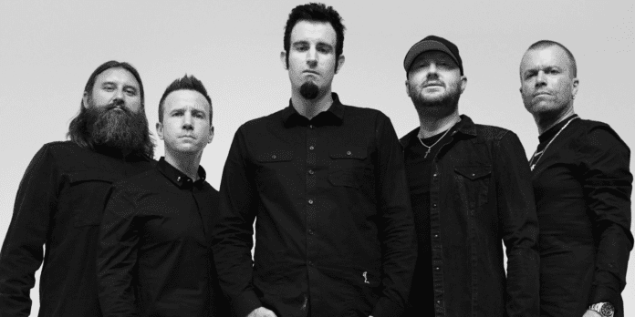 A black and white photo of a group of men, inspired by Pendulum's latest single 'Colourfast'.