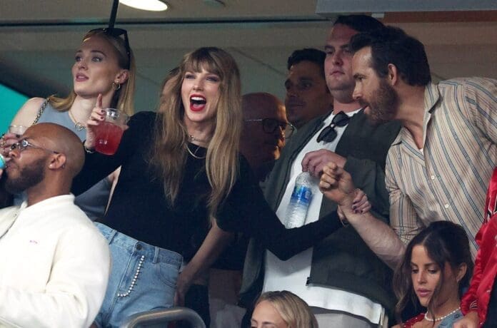 Taylor Swift and friends attend a baseball game.