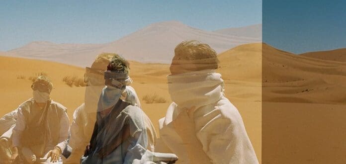 Superparka share a triumphant journey through the cosmos in a desert.