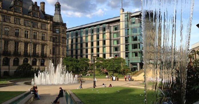 A fountain in front of a large building in Sheffield during the 2024 MOBO Awards.