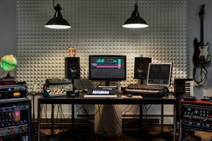 A music recording studio with next level equipment elegantly arranged on a desk, elevating the creative process.